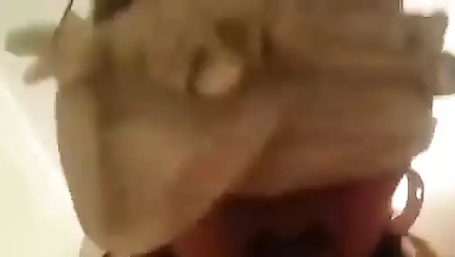 Blindfolded Asian girl gives a blowjob